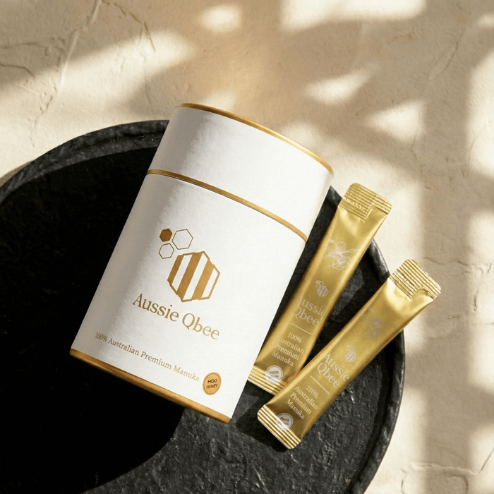 Aussie Qbee product packaging on a textured surface