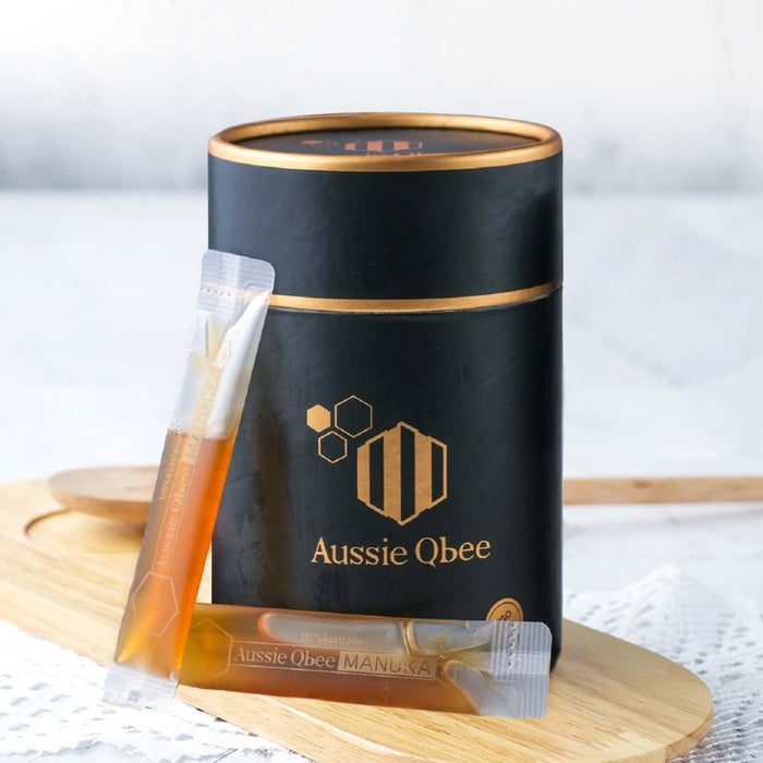 MGO 150+ Manuka honey gift package featuring Aussie Qbee canister and honey sticks.